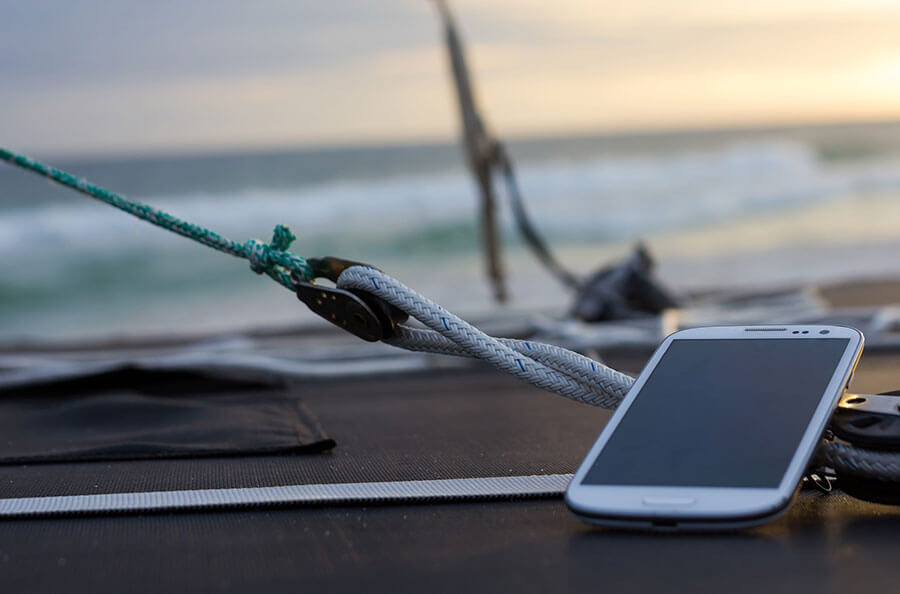 Samsung Android phone on the deck of a boat at sea in the ocean.