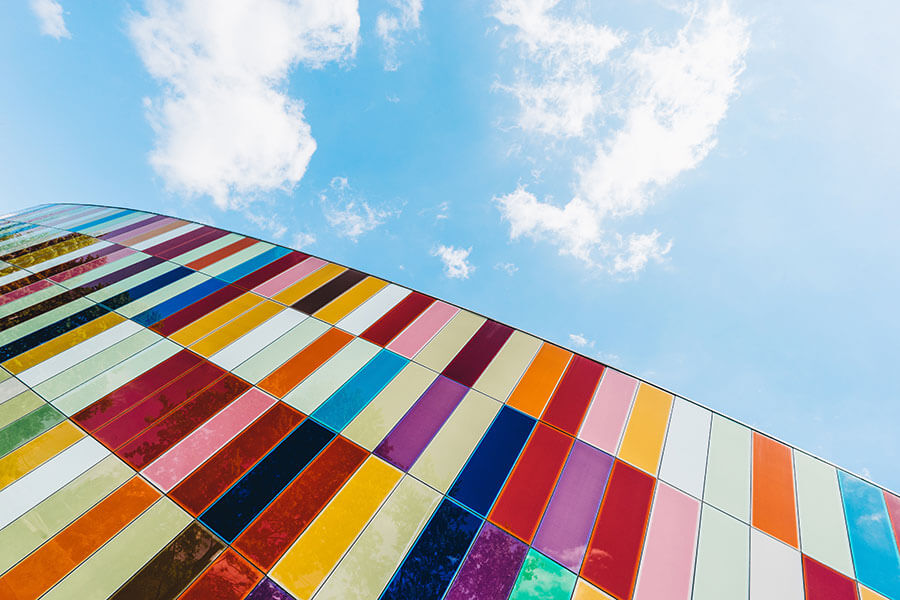 A building with multi-colored panels.