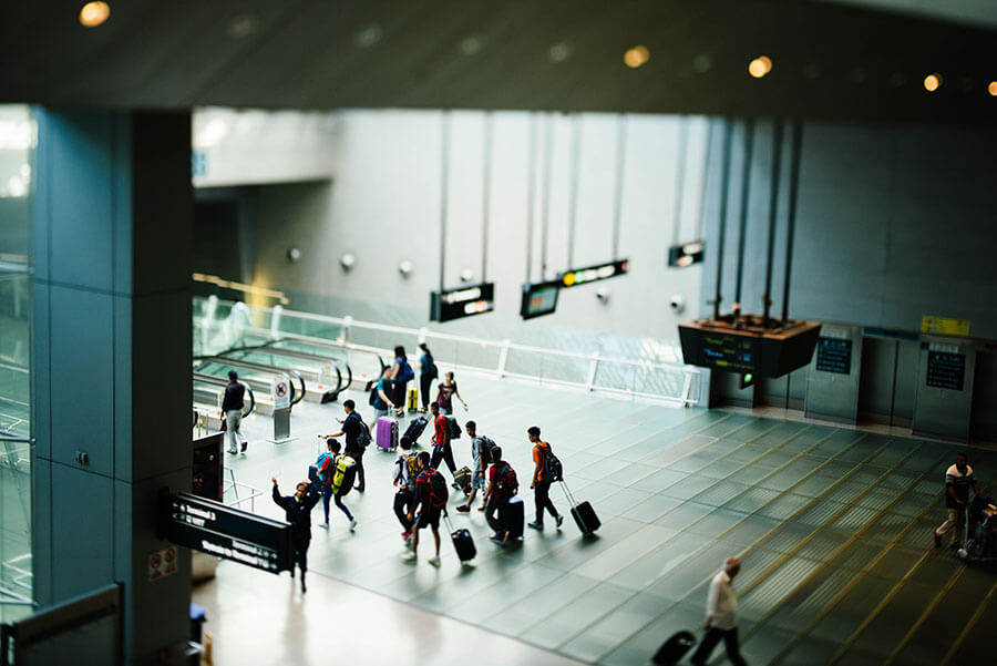 People arriving from their flights at the airport.