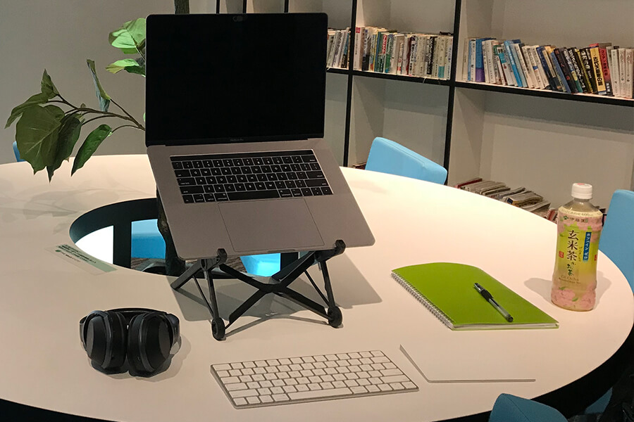 The Traveling Office at a Coworking Space - Roost Laptop Stand, Apple Magic Keyboard, Apple Magic Mouse, Headphones, a Notebook and Pen, plus some Japanese tea!