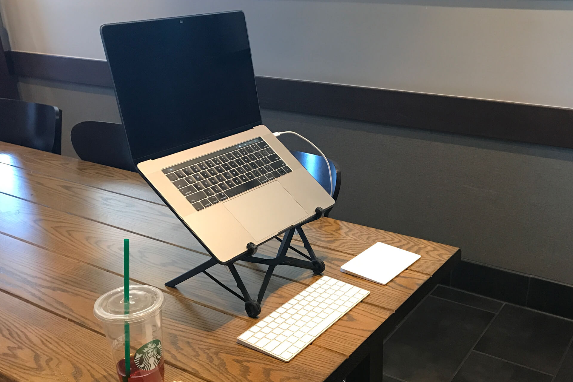The Traveling Office at a Starbucks - Roost Laptop Stand, Apple Magic Keyboard, Apple Magic Mouse